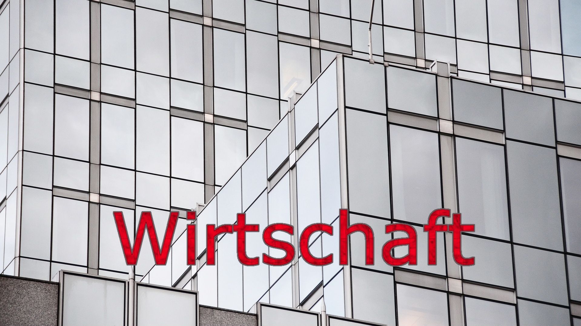Glasfassaden mit Schriftzug Wirtschaft
