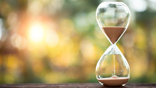 Hourglass in front of a blurred background